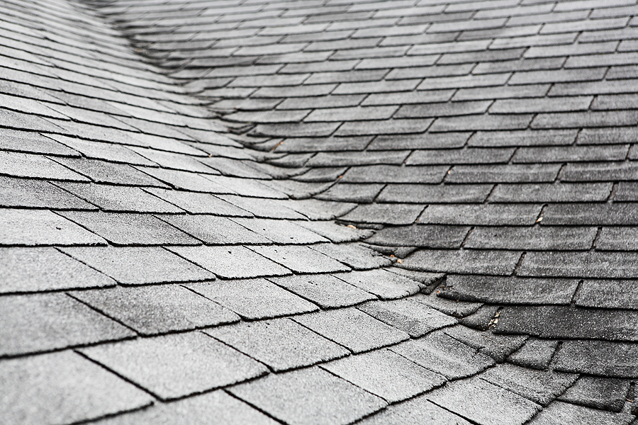 Old Composite Roof With Damage